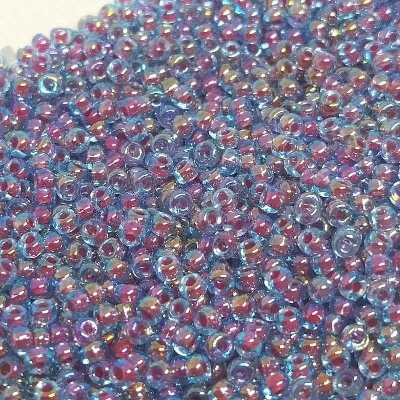 11/0 MIYUKI - rocalla - Fucsia Lined Aqua AB - 1gr.