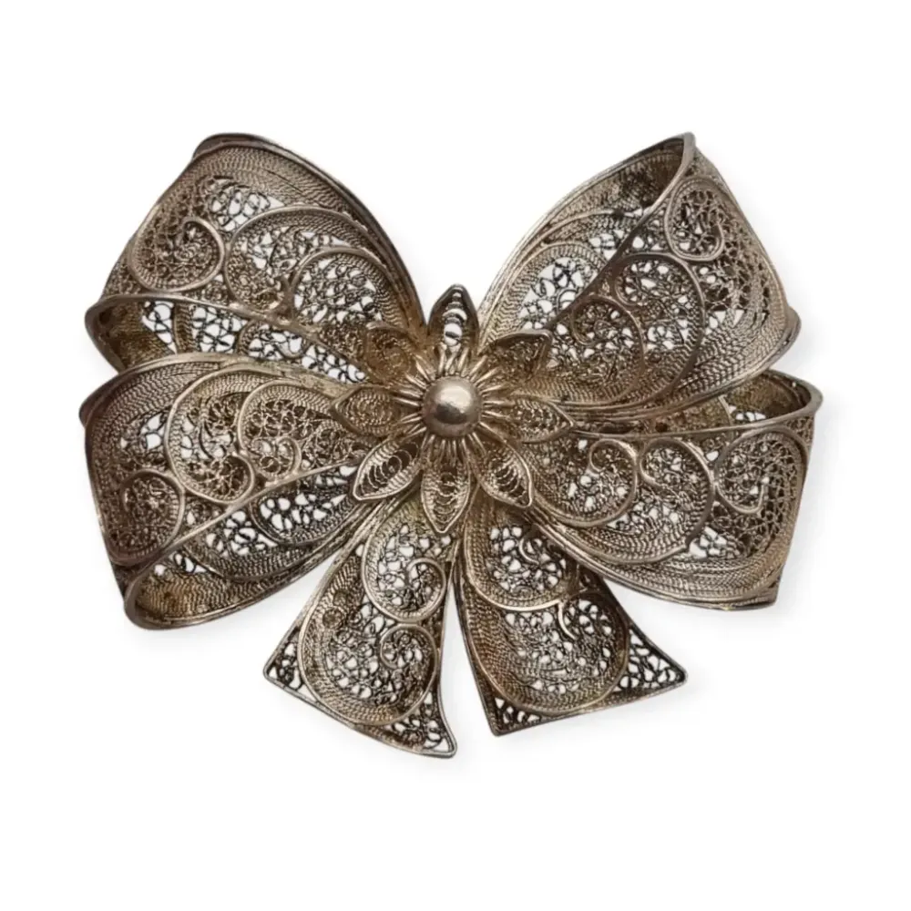 Broche vintage en forma de lazo, filigrana portuguesa en plata sterling, circa 1950.