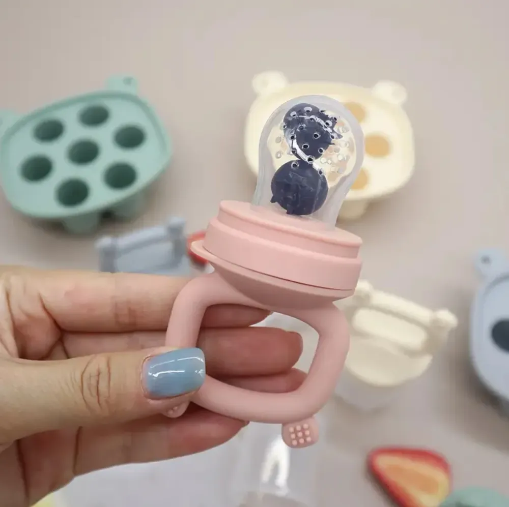 Molde en silicona + Dispensador de fruta Rosado Magic Baby