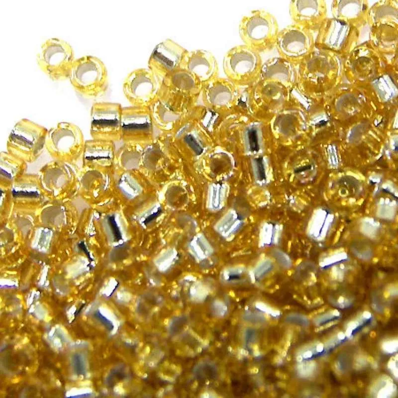 11/0 MIYUKI delica DB0042 Plata Lined Gold - 1gr.