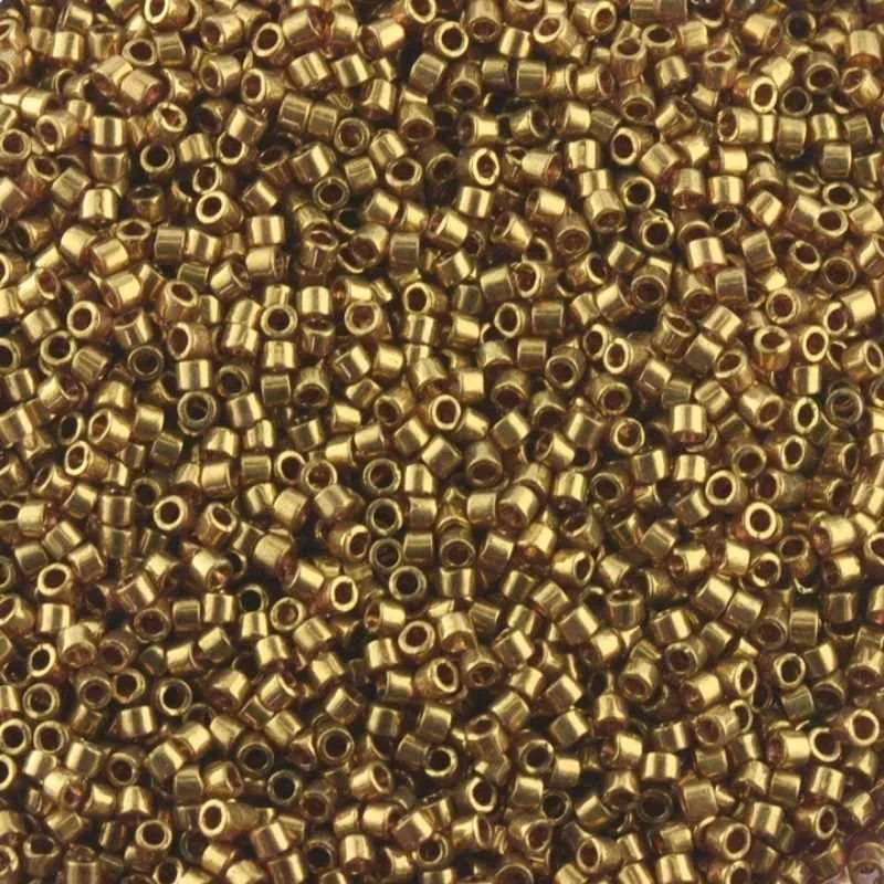 11/0 MIYUKI delica DB0115 - Tono oro Luster - 1gr.