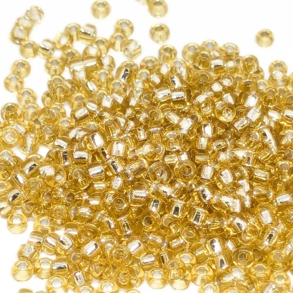 11/0 MIYUKI color: 0002 - rocalla - Light Gold plata Lined - 1gr.