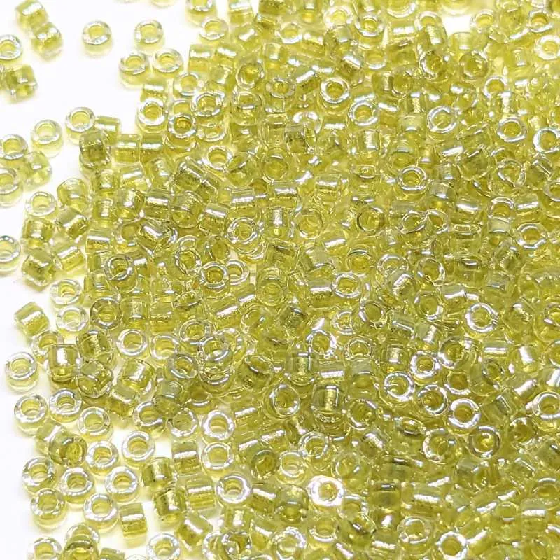 11/0 MIYUKI delica DB0910 - Sparkling Lt. Ámbar Lined Crystal - 1gr.