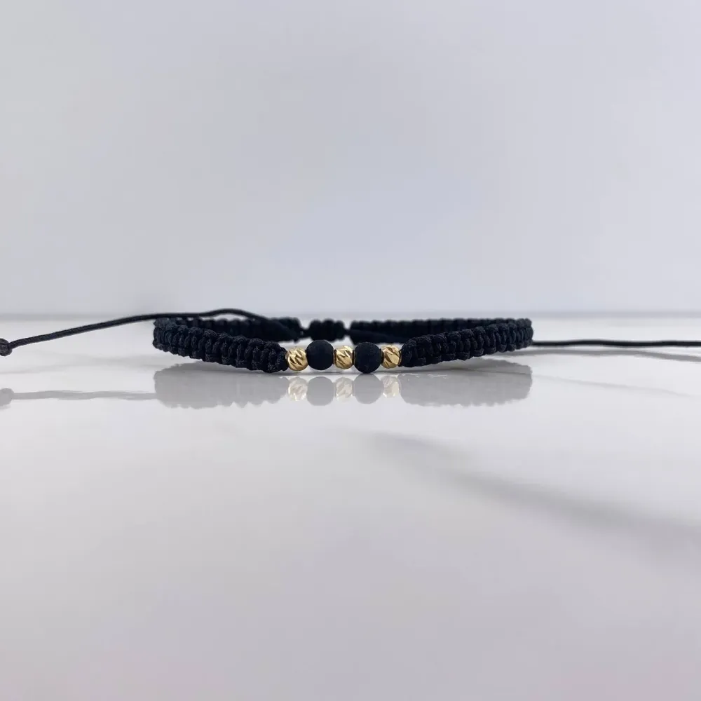 Pulsera Negra Bolas Diamantadas 0.25gr / 3mm Neoprenos Negros Oro Amarillo $