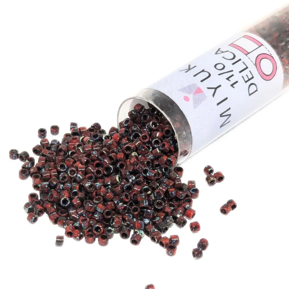 DB2263 Tubo Miyuki Delica 11/0 Picasso Opaco Red Garnet Matte 7,2gr. para Heridas Crónicas