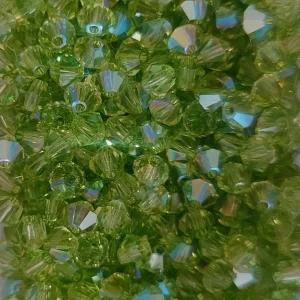 Swarovski tupi 4mm 25ud Peridot AB